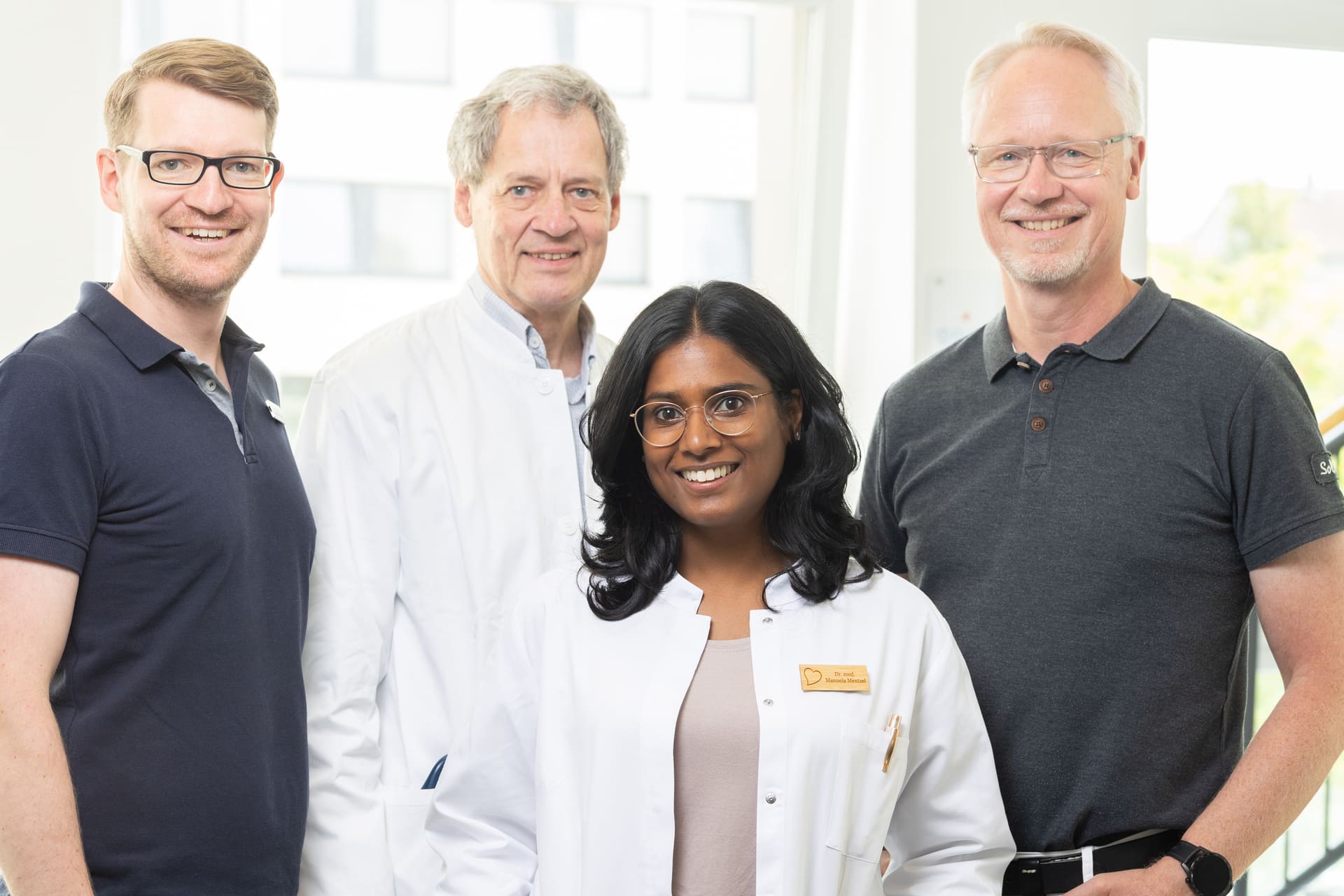 gruppenbild vier aerzte